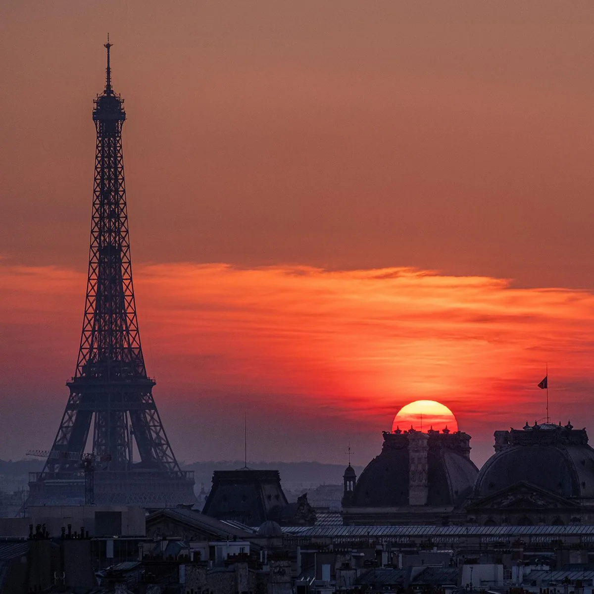 The Eiffel Tower at sunset, sky ablaze