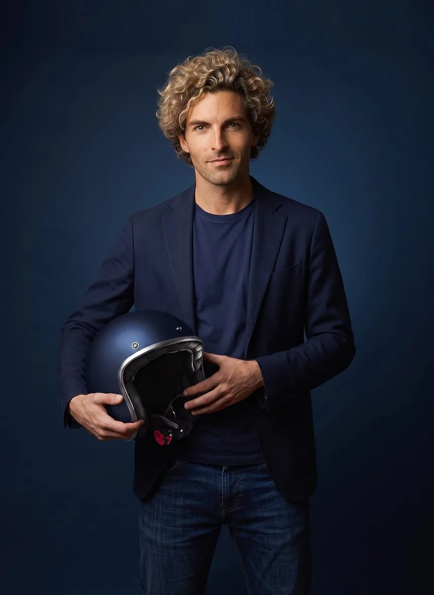 Antoine, Triumphal Tour rider, midnight blue helmet in hand