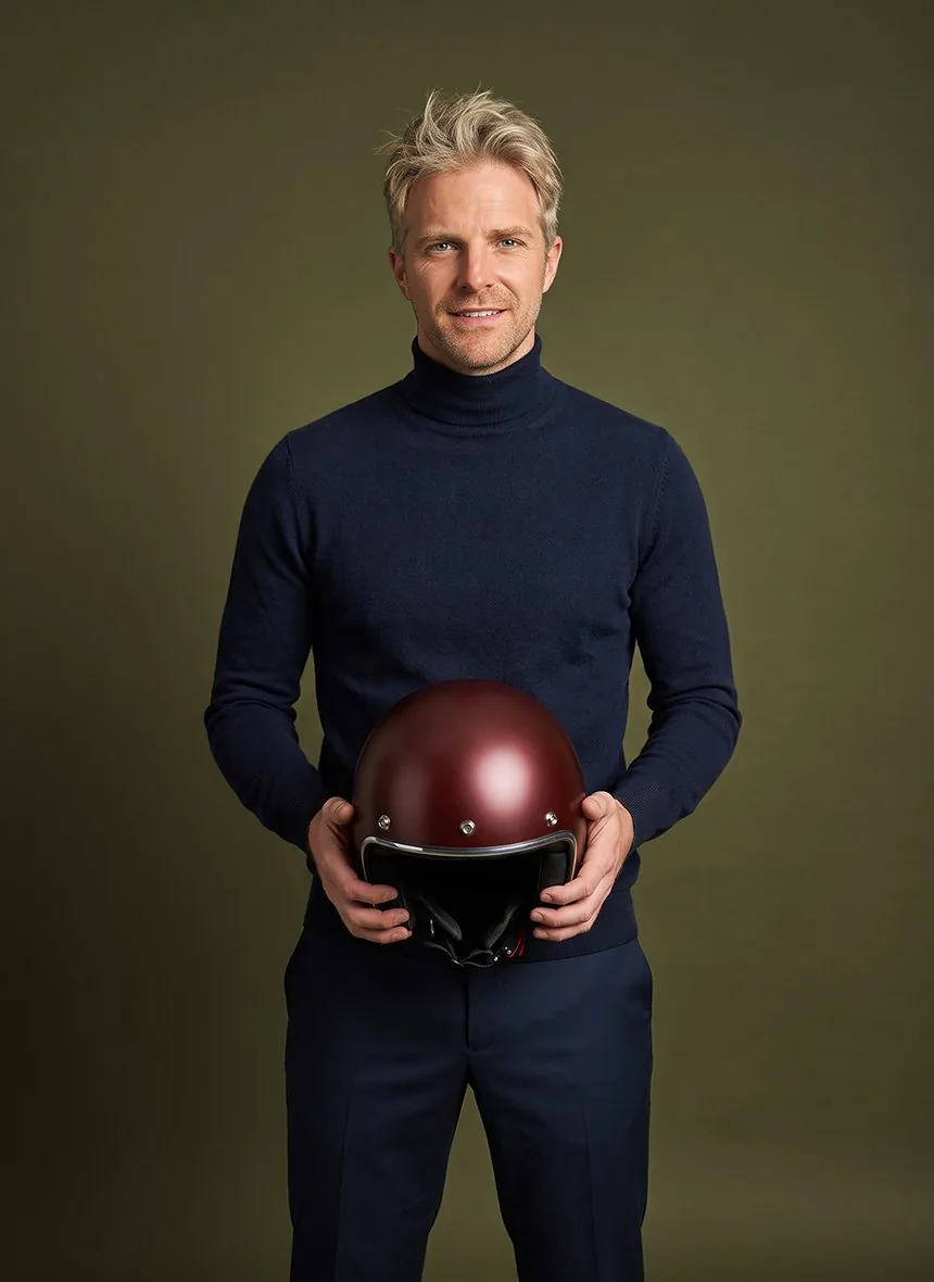 Romain, Triumphal Tour rider, burgundy helmet in hand